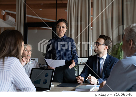 Smiling Indian businesswoman mentor executive speaking at corporate meeting 81606646