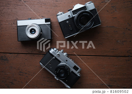 Old vintage 35 mm metal film camera, close-up. 81609502
