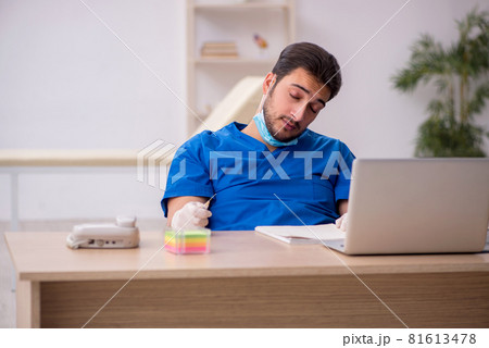 Young male doctor in vaccination concept 81613478