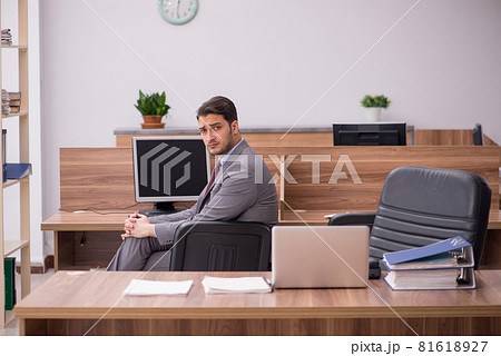 Young businessman employee working in the office Young businessman employee working in the office 81618927