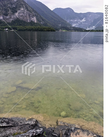 Alpine lake Hallstatter See during rain calming scene Alpine lake Hallstatter See during rain calming scene 81640082