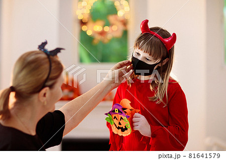 Kids trick or treat. Halloween in face mask. 81641579