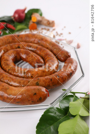 Local Northern Thai food , Northern Thai spicy sausage street food isolated in white background Local Northern Thai food , Northern Thai spicy sausage street food isolated in white background 81642706