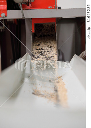 Factory machine Milling rice in close up Factory machine Milling rice in close up 81643286