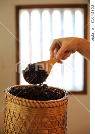 Boiled riceberry rice on wood basket with spoon in close up Boiled riceberry rice on wood basket with spoon in close up 81643352