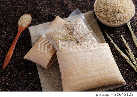 Organic raw brown rice and riceberry rice in close up 81645128