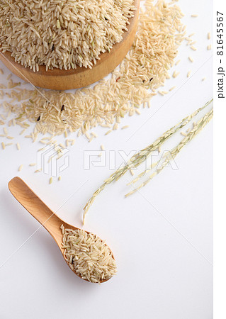 Organic raw brown rice in close up 81645567