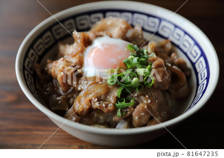 pork rice bowl with egg on wood backround japanese local food butadon 81647235