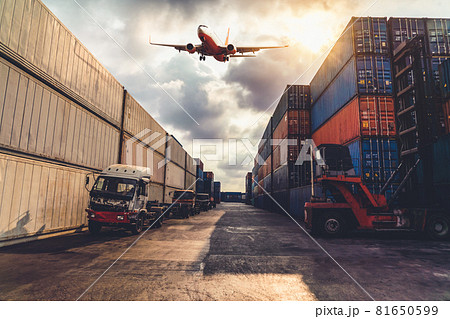 Cargo container for overseas shipping in shipyard with airplane in the sky . Cargo container for overseas shipping in shipyard with airplane in the sky . 81650599