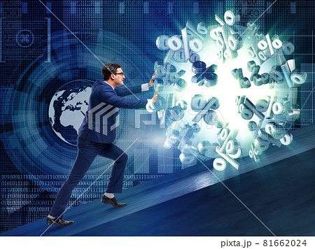 Businessman pushing away high interest rates 81662024