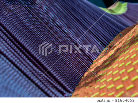 Braided colorful ropes, Soft and flexible rope. Beautiful cotton rope woven together in orderly manner and shallow depth of field. Braided colorful ropes, Soft and flexible rope. Beautiful cotton rope woven together in orderly manner and shallow depth of field. 81664058