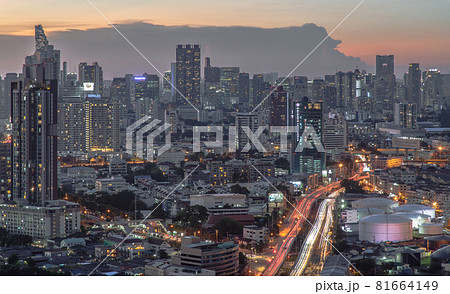Aerial view of Beautiful scenery view of Skyscraper Evening time Sunset creates relaxing feeling for the rest of the day. 81664149