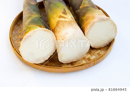 Fresh bamboo shoots in basket on white background. Fresh bamboo shoots in basket on white background. 81664945