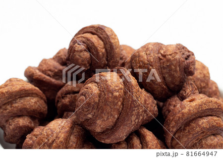 Mini chocolate croissant on white background. Mini chocolate croissant on white background. 81664947