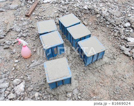 MALACCA, MALAYSIA -MAY 18, 2016: Cube test. Steel mold in square shape used to get standard square shape concrete block. The concrete block will be used for compression test in laboratory.  81669024