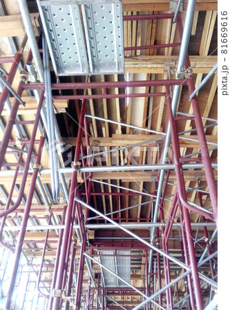 KEDAH, MALAYSIA -AUGUST 05, 2016: Scaffolding used as the temporary structure to support platform, form work and structure at the construction site. Also used it as a walking platform for workers.  81669616