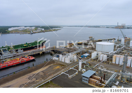 Aerial view tanker ship unloading in port of logistic import export business 81669701