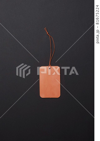 Black friday concept. An empty shopping tag on dark background 81675224