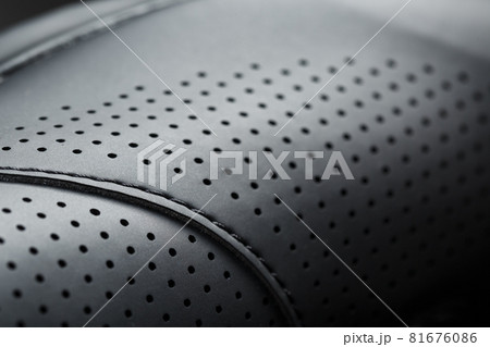 Perforated material made of black imitation leather in full screen 81676086