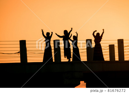 Georgian dancing on the pier in sunset Georgian dancing on the pier in sunset 81676272