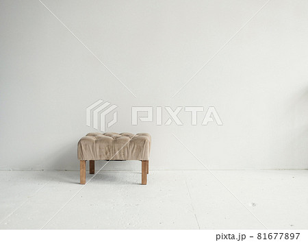 Stylish armchair near wall 81677897