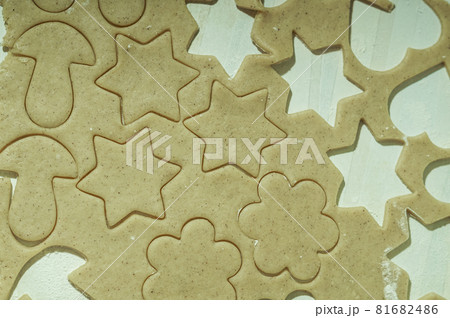 Rolled dough for making cookies cut into molds. Rolled dough for making cookies cut into molds. 81682486