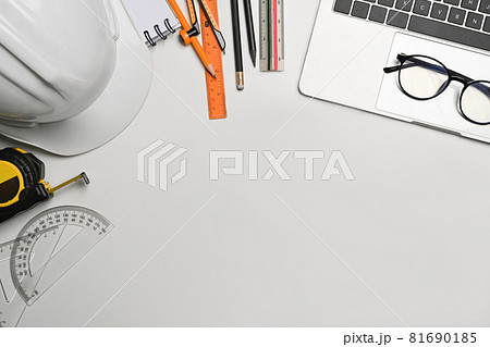 Top view, Engineer tools and laptop computer on white table. 81690185
