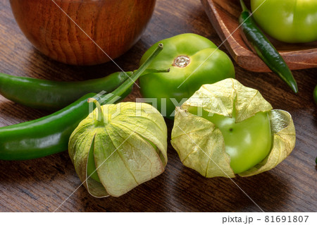 Tomatillos, green tomatoes, and chili peppers. Mexican cuisine ingredients 81691807
