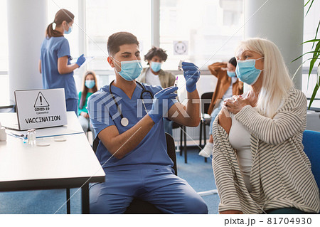 Doctor Taking Dose Of Covid-19 Vaccine For Senior Woman Doctor Taking Dose Of Covid-19 Vaccine For Senior Woman 81704930