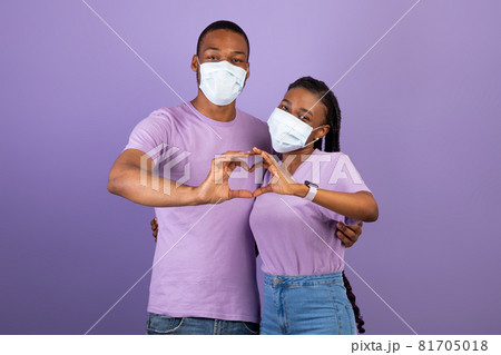 African American couple in mask making heart gesture 81705018