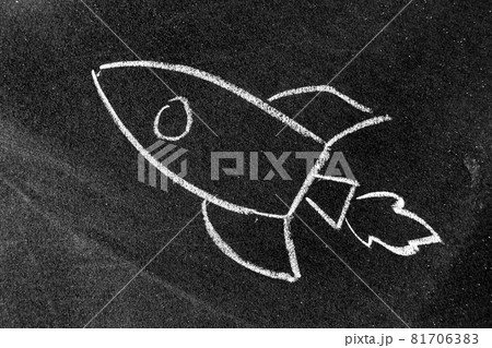 White color chalk hand drawing in rocket shape on blackboard or chalkboard background (Concept for new experience, start up the business) White color chalk hand drawing in rocket shape on blackboard or chalkboard background (Concept for new experience, start up the business) 81706383
