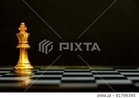Gold king chess piece stand on black background with copy space (Concept for leadership, unique) Gold king chess piece stand on black background with copy space (Concept for leadership, unique) 81706385