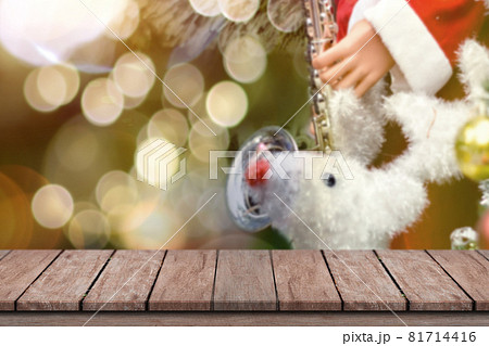 Christmas holiday background. Empty wooden deck table over bokeh light for product montage 81714416