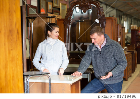 Married couple chooses new furniture in the store Married couple chooses new furniture in the store 81719496