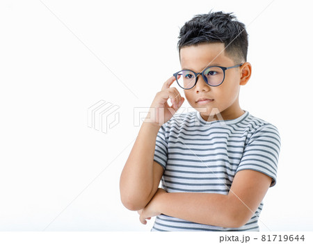 Cutout portrait of pity young Asian boy wearing glasses and casual horizontal striped shirt thinking and considering seriously on difficulty and hard to decide right solution or selection Cutout portrait of pity young Asian boy wearing glasses and casual horizontal striped shirt thinking and considering seriously on difficulty and hard to decide right solution or selection 81719644