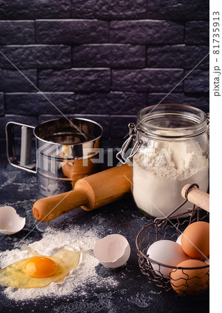 Table with baking products and tools. Table with baking products and tools. 81735913
