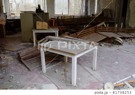 Old broken furniture in an abandoned building in Pripyat. A room in an abandoned kindergarten in the Chernobyl exclusion zone. Old broken furniture in an abandoned building in Pripyat. A room in an abandoned kindergarten in the Chernobyl exclusion zone. 81738253
