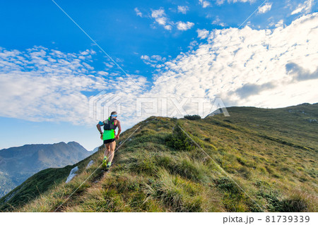 Sporty mountain man rides in trail during endurance race Sporty mountain man rides in trail during endurance race 81739339