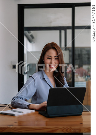 Portrait asian Businesswoman Working On Laptop In cafe coffee shop 81747161
