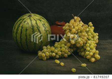 Still life with watermelon, grapes and a vase 81749207