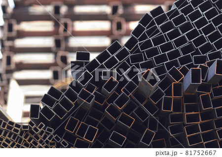 Metal profile pipe of rectangular cross section in packs at the warehouse of metal products Metal profile pipe of rectangular cross section in packs at the warehouse of metal products 81752667