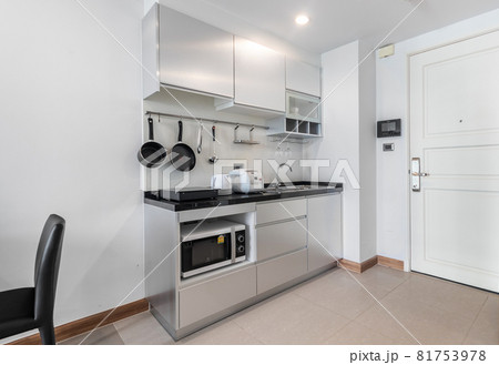 Modern white Kitchen Counter and Kitchen Equipment in Luxurious Apartment. small kitchen counter ideas in the residential Modern white Kitchen Counter and Kitchen Equipment in Luxurious Apartment. small kitchen counter ideas in the residential 81753978