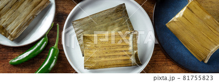 Tamal panorama. Traditional dish of Mexican cuisine, wrapped in green leaves 81755823