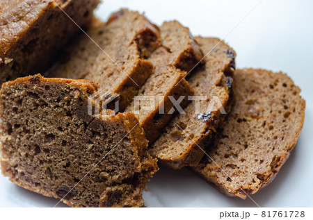 Freshly made spiced fruit  loaf cake  on the white  background 81761728