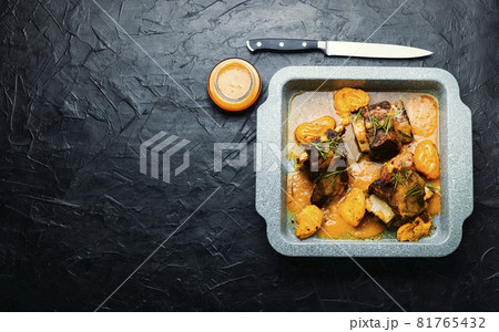 Beef ribs in apricots,flat lay Beef ribs in apricots,flat lay 81765432