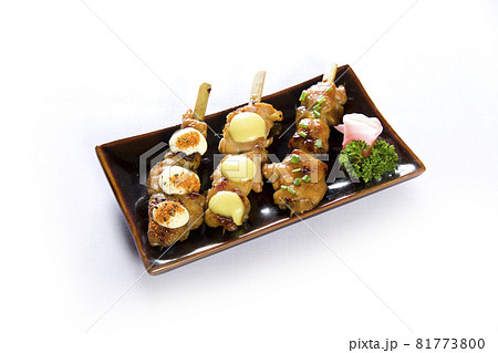 Various kind of grilling kushiyaki or meat skewers on white background. Japanese style skewered food in the izakaya restaurant. Various kind of grilling kushiyaki or meat skewers on white background. Japanese style skewered food in the izakaya restaurant. 81773800