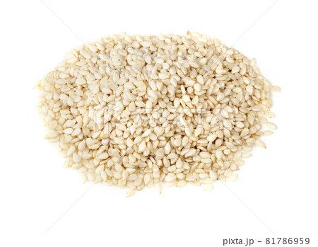 handful of white sesame seeds closeup on white background handful of white sesame seeds closeup on white background 81786959