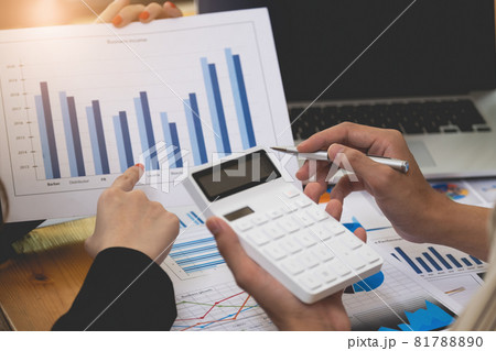 Business team working together and training to analyze technical price graph and indicator. Business team working together and training to analyze technical price graph and indicator. 81788890