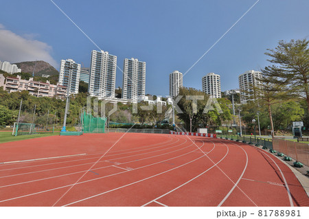 a Running track in a sports stadium, blue sky a Running track in a sports stadium, blue sky 81788981