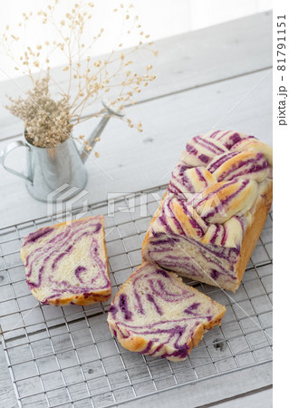 fresh baked purple sweet potato bread loaf on rack fresh baked purple sweet potato bread loaf on rack 81791151
